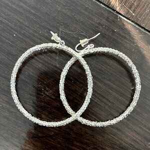 Silver tone dangle earrings